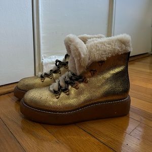 Never worn, brand new with additional purple laces!